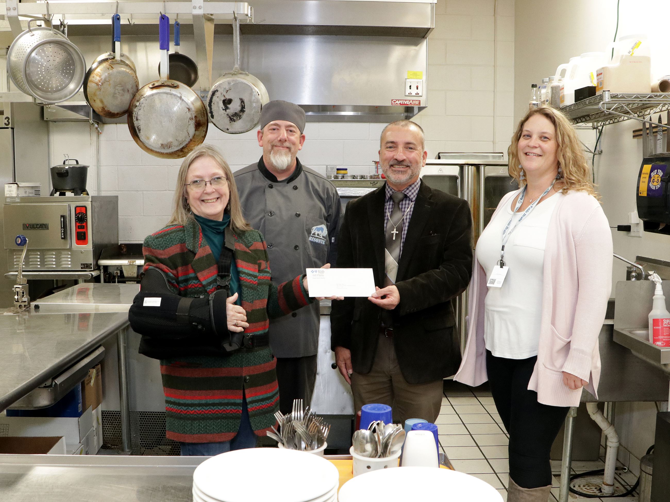 U.S. Senator Roger Marshall tours kitchen at New Beginnings Bisonte Food Service - News Image